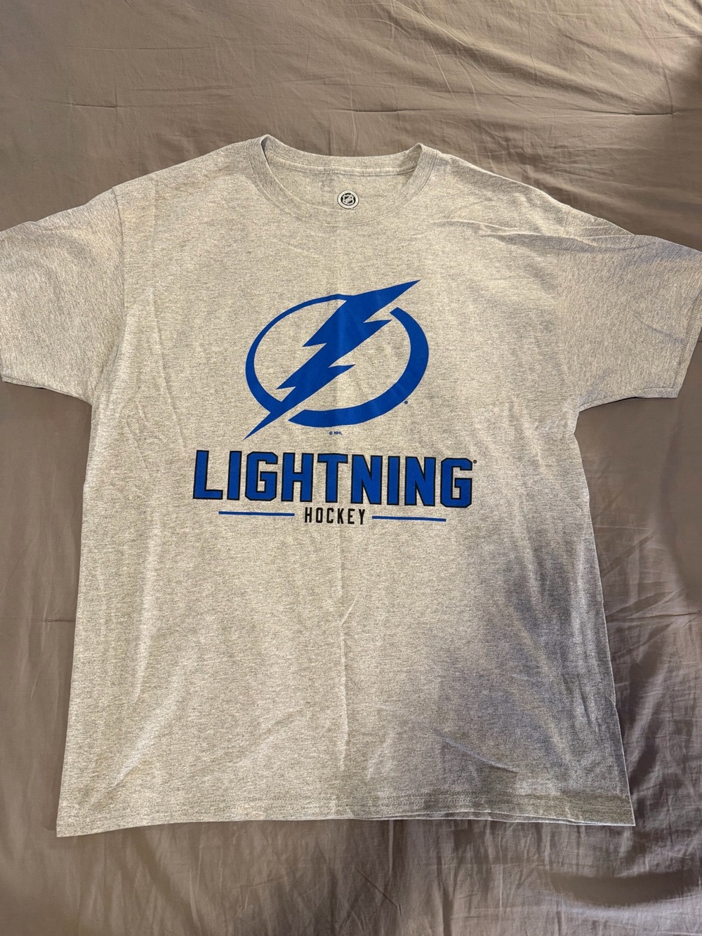 NHL Gray Tee with Blue Lightning Logo